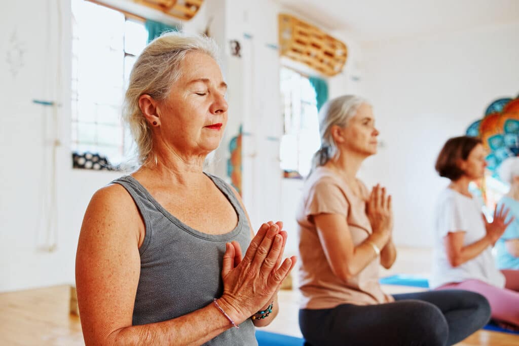 Practicing yoga with The Original Spinners.