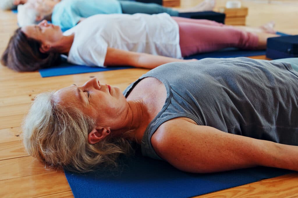 Practicing yoga with The Original Spinners.